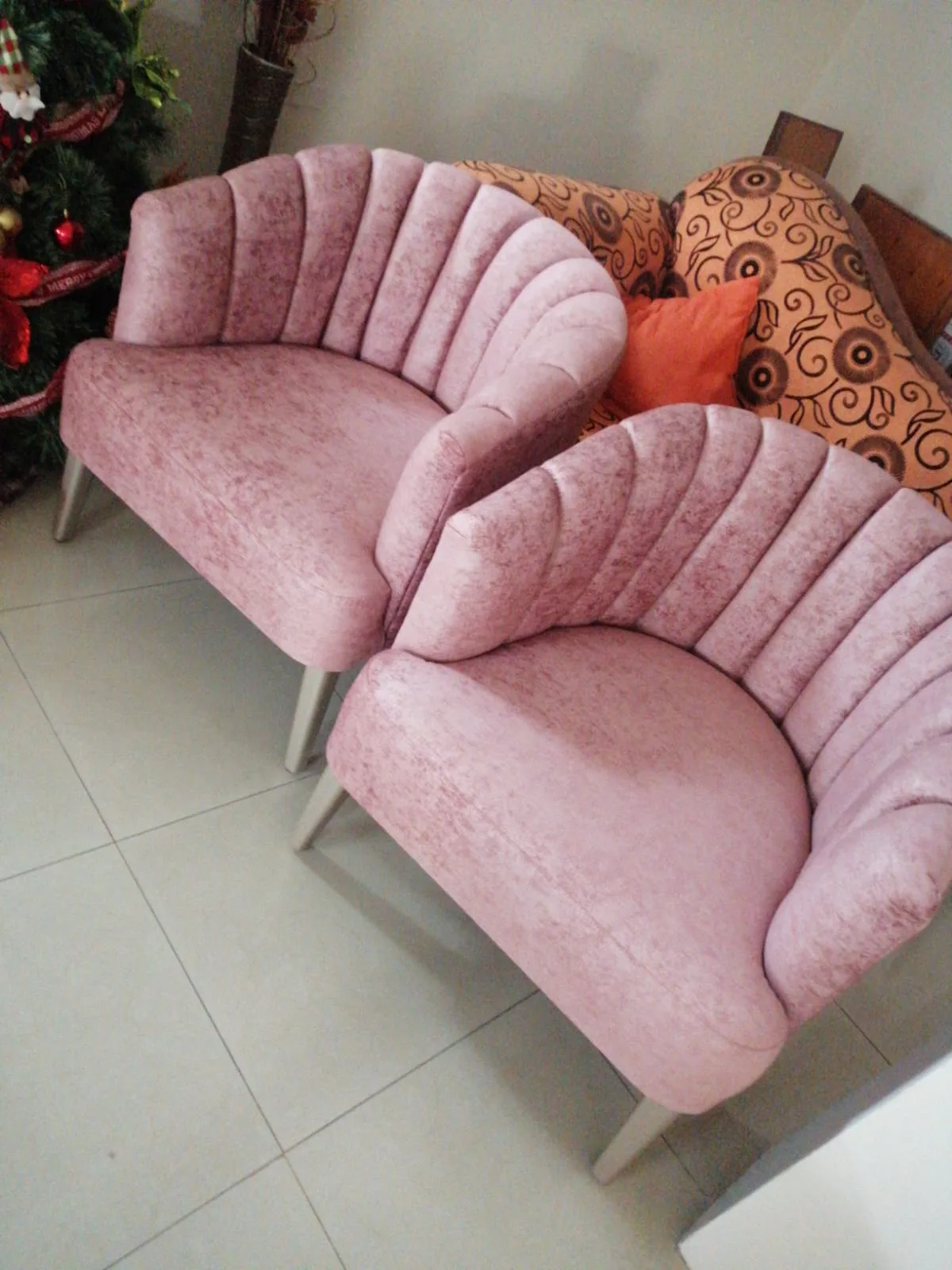 Sillón capitoné respaldo concha