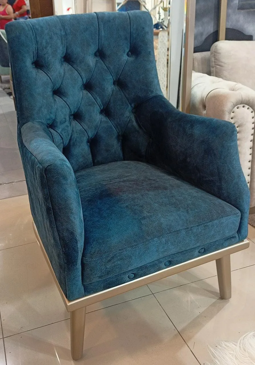 Sillón orejero capitoné